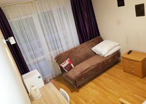 Posedenie v ubytovaní Apartamenty i Pokoje przy Parku