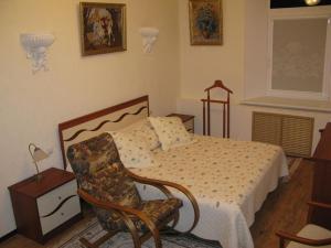 Кровать или кровати в номере Гостиный Двор на Троицкой