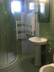 Koupelna v ubytování Best Hotel