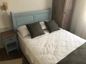 Postel nebo postele na pokoji v ubytování Ayshe Hotel