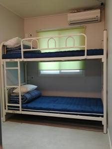 Palanda nebo palandy na pokoji v ubytování Bomgoro Guesthouse