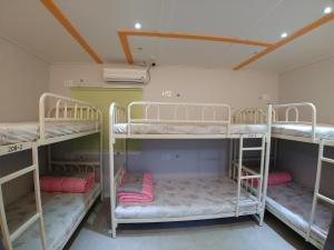 Postel nebo postele na pokoji v ubytování Bomgoro Guesthouse