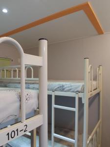 Postel nebo postele na pokoji v ubytování Bomgoro Guesthouse