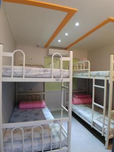 Postel nebo postele na pokoji v ubytování Bomgoro Guesthouse