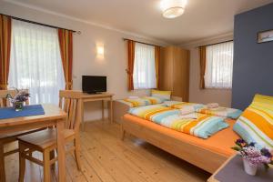 Posteľ alebo postele v izbe v ubytovaní Säuleck Appartement inkl Kärntencard