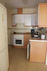 Kuchyňa alebo kuchynka v ubytovaní Apartamento Cala de Nerja II