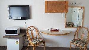 Kuchyň nebo kuchyňský kout v ubytování Coachman Motel