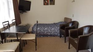 Posezení v ubytování Coachman Motel