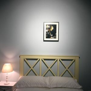 Postel nebo postele na pokoji v ubytování 97Rock bookstore Hostel