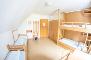 Voodi või voodid majutusasutuse Jugendgästehaus Ulrichsberg toas