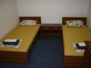 Säng eller sängar i ett rum på YALTA guesthouse