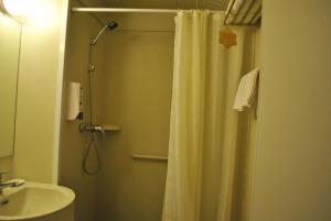 Un baño de Goldmet Inn South Loop armed, Datong