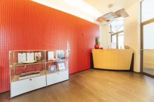 Un televizor și/sau centru de divertisment la Royal Hotel - Urban Living