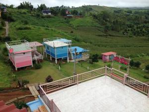 an aerial view of a house on a hill at Charmtalamok Khaokho Resort in Ban Khao Ya Nua