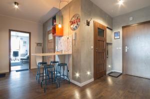 Kuchyň nebo kuchyňský kout v ubytování Quattro Loft Hostel
