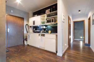 Kuchyň nebo kuchyňský kout v ubytování Quattro Loft Hostel + 37 fotografií