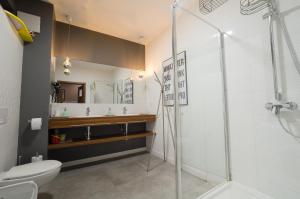 Koupelna v ubytování Quattro Loft Hostel