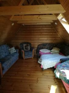 Кровать или кровати в номере Guest House Vējaines