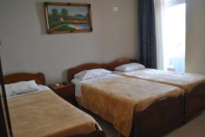 Postel nebo postele na pokoji v ubytování Eden Hotel + 34 fotografií