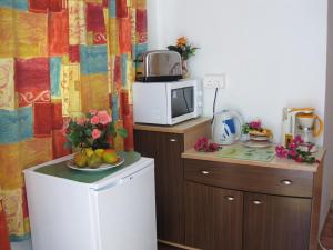 Кухня или мини-кухня в Villa Kissen
