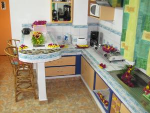 Кухня или мини-кухня в Villa Kissen
