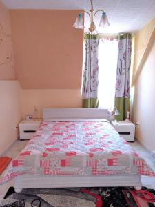 Posteľ alebo postele v izbe v ubytovaní Valloris Apartments