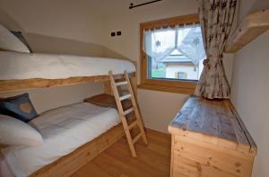 A bed or beds in a room at Chalet Teo e Marianna