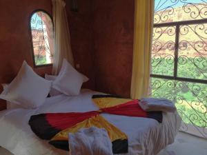 Postel nebo postele na pokoji v ubytování Kasbah Titrit & Spa