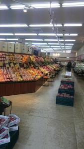 a store filled with lots of fruits and vegetables at Miyuki House Hostel 1 in Kashiwa