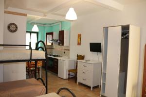 A television and/or entertainment centre at Agriturismo Fattoria del Colle