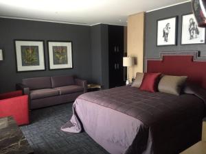 Кровать или кровати в номере Mia City Hotel