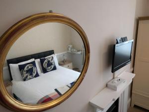 A bed or beds in a room at Blyth Hotel 