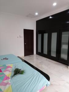 Postel nebo postele na pokoji v ubytování JB Homestay Bukit Indah WiFi CIQ Mall Legoland Free Parking