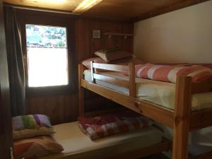 Ένα ή περισσότερα κρεβάτια σε δωμάτιο στο Almenrausch