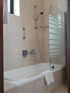 Ванна кімната в Beatrix Hotel