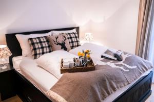 Ein Bett oder Betten in einem Zimmer der Unterkunft Steinberghaus Apartments