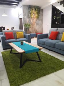 Posezení v ubytování JB Homestay Bukit Indah WiFi CIQ Mall Legoland Free Parking