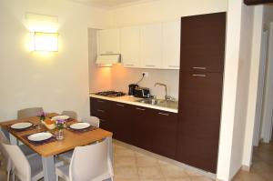 Køkken eller tekøkken på Apartment | in Tropical Resort | pool | close to beach