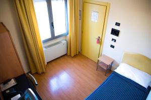 Posteľ alebo postele v izbe v ubytovaní Hotel Masini