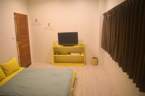 TV a/nebo společenská místnost v ubytování 菜爺爺親子蔬宿Vegepapa B&B