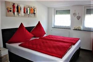 En eller flere senge i et værelse på BodenSEE Apartment Steinackerweg