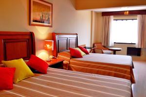 Krevet ili kreveti u jedinici u okviru objekta Hotel Manduara