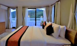 Letto o letti in una camera di Hotel Raniban Arcade