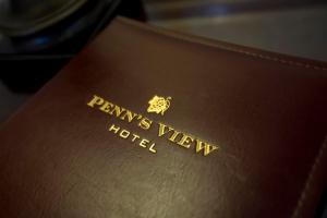 a close up of a brown leather book with the words payments view hotel at Penn's View Hotel Philadelphia in Philadelphia