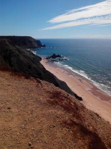 a view of a beach with the ocean at Vivenda Familia Pedro in Vila do Bispo
