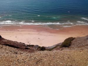 an aerial view of a sandy beach next to the ocean at Vivenda Familia Pedro in Vila do Bispo