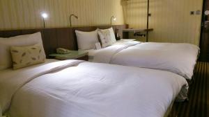 Postel nebo postele na pokoji v ubytování Beauty Hotels - Hotel Bnight-Self Check-In Hotel
