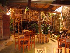 مطعم أو مكان آخر لتناول الطعام في Hotel Casa Tarzan