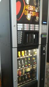 a heart of coffee vending machine with drinks in it at Hostel Ruschuk in Ruse