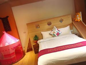 Voodi või voodid majutusasutuse Shang Shui Yun Ji B&B toas